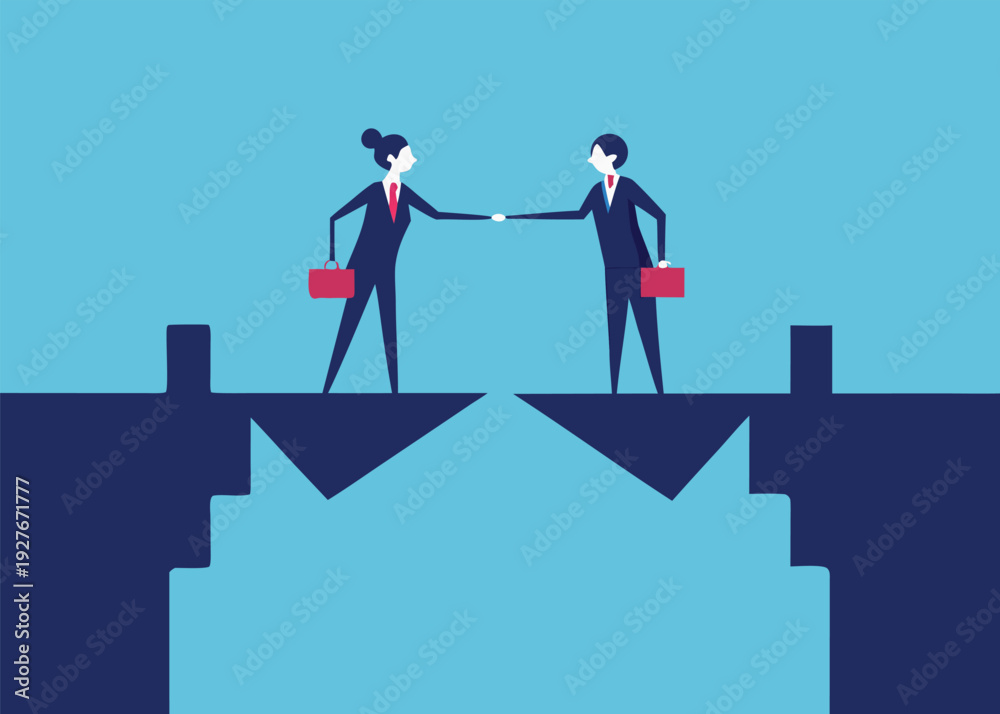 Fototapeta premium A business man and woman in suits shake hands across a broken bridge signifying connection.