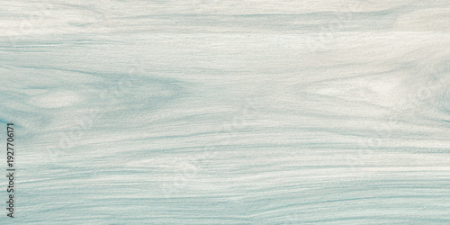 soft pastel blue wood texture background featuring natural flowing grain patterns for coastal themed designs