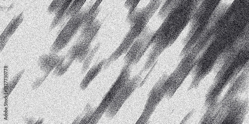 Diagonal abstract grayscale texture with sharp, elongated streaks and speckled noise, conveying a sense of speed, energy, or abstract brushwork for design elements