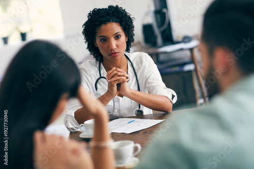 Tableau sur toile Doctor, consulting and talking with couple in office for gynecologist, ivf treatment and healthcare