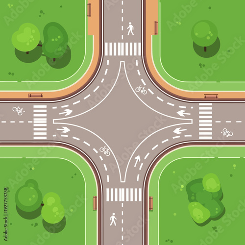 Aerial View of a Modern City Intersection with Pedestrian Crossings and Bike Lanes
