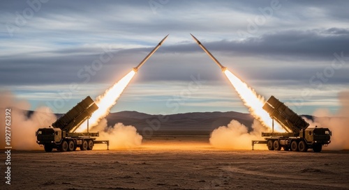 Two military rocket launchers firing missiles into the sky during a desert exercise.
