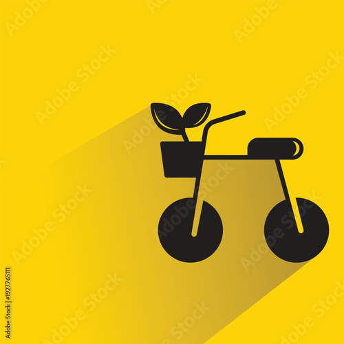 bicycle and plant icon with shadow on yellow background