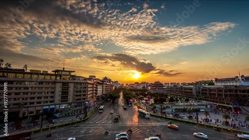 Stunning city timelapse footage capturing the transition from sunrise to sunset, with golden hour light, dramatic clouds, and city lights illuminating the urban skyline in 4K.