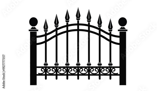 Black metal gate with pointed tips and decorative scrollwork