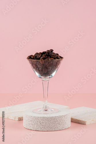 Wallpaper Mural Coffee beans in a wine glass and photo props with a pink backdrop. Torontodigital.ca