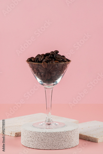 Wallpaper Mural Coffee beans in a wine glass and photo props with a pink backdrop. Torontodigital.ca