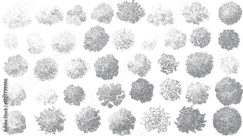 Grey textured organic shapes scattered on white background abstract