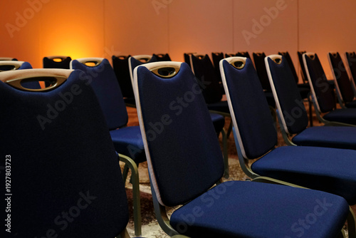 Empty seats before a conference session