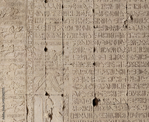 Wallpaper Mural Ancient hieroglyphs carved into stone wall in historic monument Torontodigital.ca