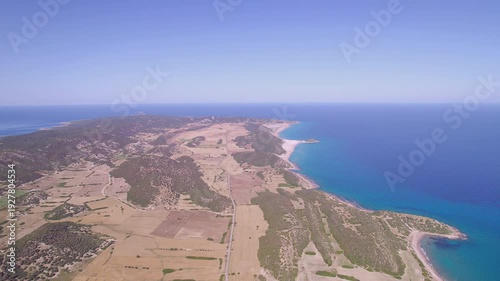 Scenic High Drone Flight Over Golden Beach and Karpaz Peninsula in Bright Sunshine, Northern Cyprus