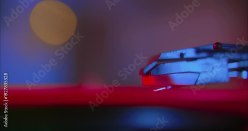 Macro shot of a turntable playing a vinyl record album