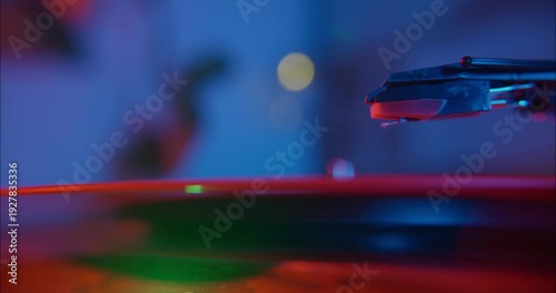 Macro shot of a turntable playing a vinyl record