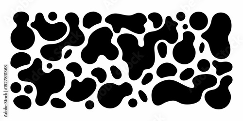 Abstract black and white pattern resembling cow spots on a white background
