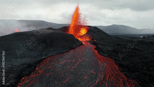 Wallpaper Mural Volcanic eruption glowing lava flow streaming from crater, dramatic smoke and fire, raw natural phenomenon in Iceland Torontodigital.ca