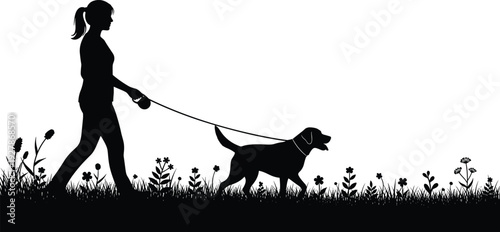 Silhouette of a young woman walking her dog on a leash through a flower meadow isolated on white background together