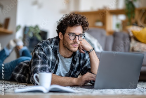 Male adult attending online business meeting home