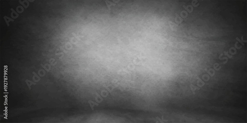 A blank dark grunge wall background with an old gray concrete texture and vintage black paper pattern design for a dirty textured surface backdrop