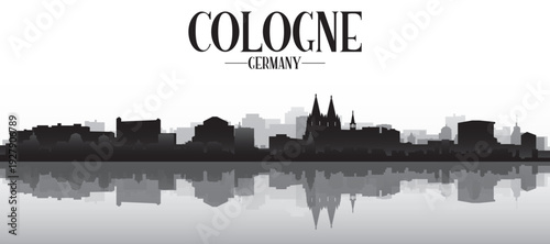 Black and white panoramic poster of the city skyline with misty background buildings and water reflection of COLOGNE, GERMANY