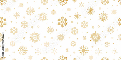Golden snowflakes scattered across a bright white background pattern