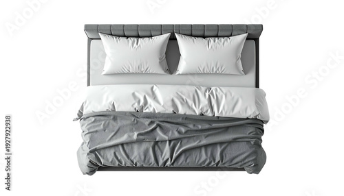 Aerial view of a bed with pillows, duvet, and blanket in shades of gray and white