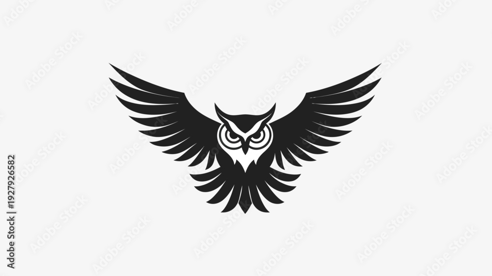 Fototapeta premium Black and white owl silhouette with outspread wings against white background