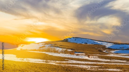 dramatic sunset over a spring hills time lapse scene