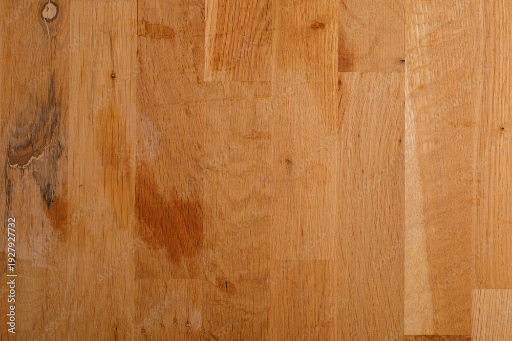 Fototapeta premium Close-up of a wooden texture with visible grain, perfect for backgrounds. Represents nature, warmth, and natural materia