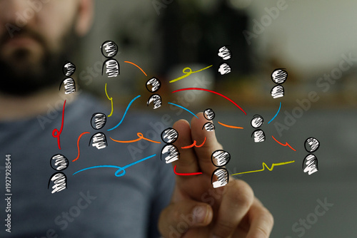 Hand touching a network of ...