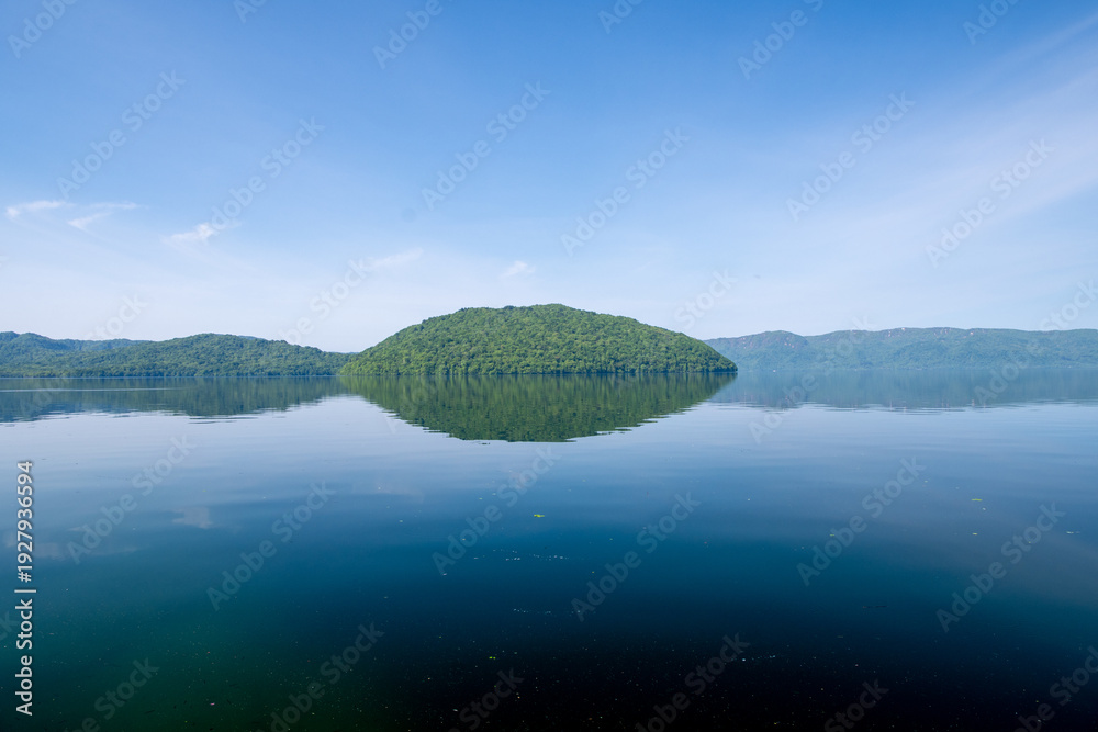 Fototapeta premium Calm Reflections of Forested Hills on Lake Towada, Aomori, Japan