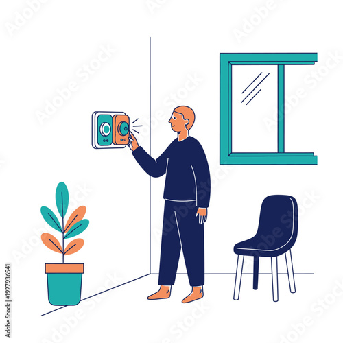 Man adjusting the thermostat in a modern room with a potted plant and chair.