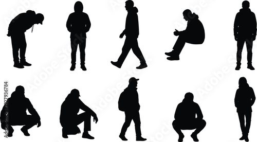 Collection of black silhouettes featuring men and women in winter jackets and hoodies in various poses including walking sitting and crouching isolated on white background
