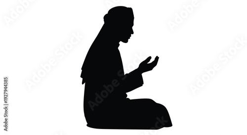 A kneeling man in traditional attire depicted in black silhouette