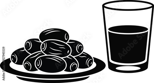 A plate of olives and a glass of juice