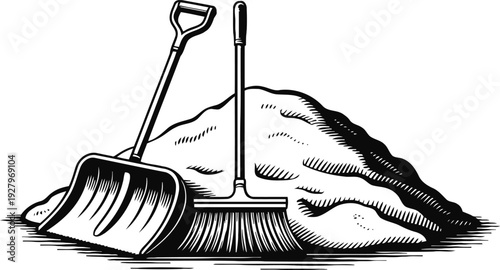 Pile of sand with shovel and broom cleaning tools construction site equipment for manual work and maintenance