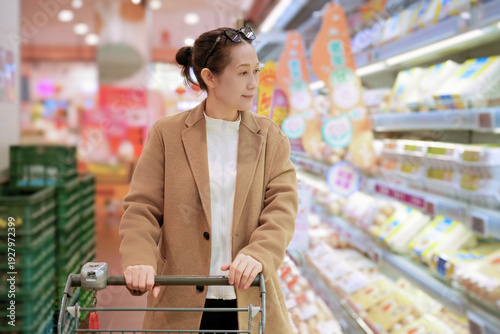 Принти на полотні Woman Shopping with Cart in Supermarket