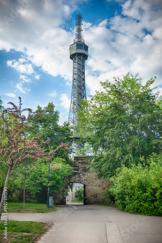 Petrin lookout tower rising above trees in Prague, Czech Republic