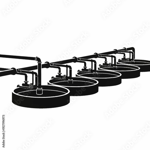Industrial water treatment plant with multiple circular tanks and connecting pipes.