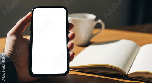 Wallpaper Mural Phone sparkles near book and warmly coffee cup. Torontodigital.ca