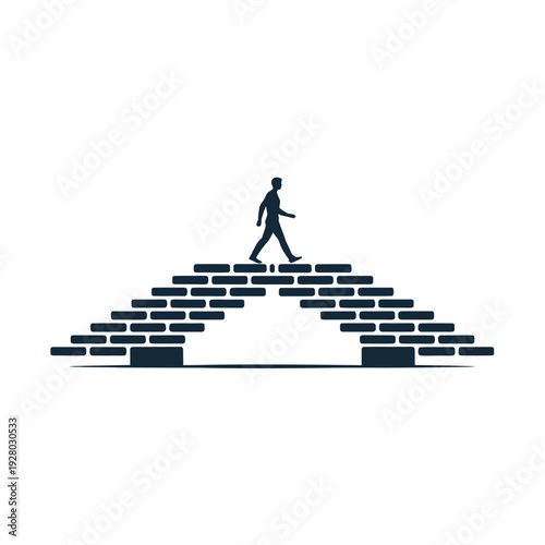 Silhouette of a person walking up a staircase made of rectangular blocks