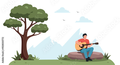 A man sitting on a rock playing an acoustic guitar under a tree with mountains in the background in a serene outdoor setting.