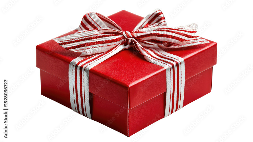 Obraz premium Gift of Joy: A vibrant red gift box, adorned with a festive ribbon, symbolizes the spirit of giving and the anticipation of opening a treasured present.
