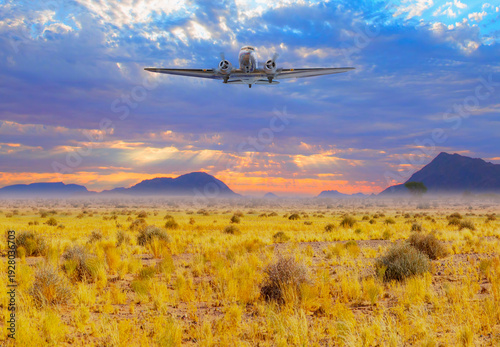 Photos A twin-engine vintage propeller plane flies over the Namib Desert - Typical land