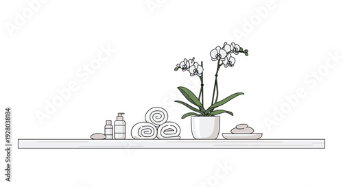 A white shelf holds a potted white orchid, three rolled white towels, two bottles, and a stack of smooth grey stones.