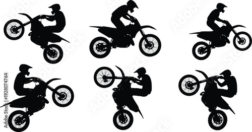 Black silhouettes of motorcyclists performing stunts on dirt bikes motorcycle trick