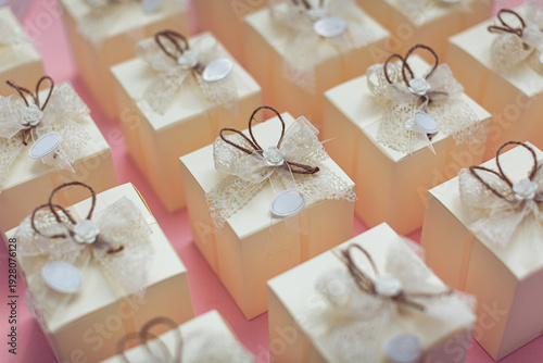 Cuadro en lienzo Series beige white boxes decorated white lace brown bows roses oval labels, on p