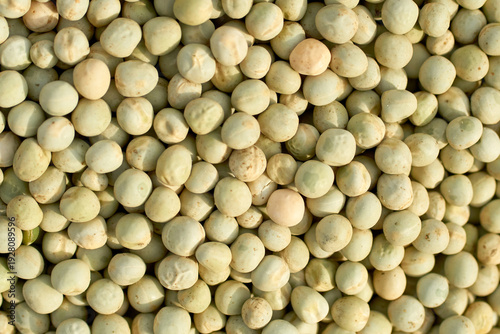 Fresh green peas background texture top view