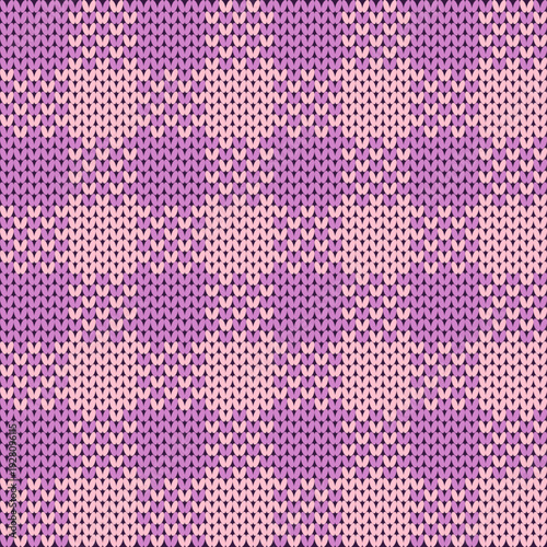 A pink plaid knitted yarn pattern in a square shape.