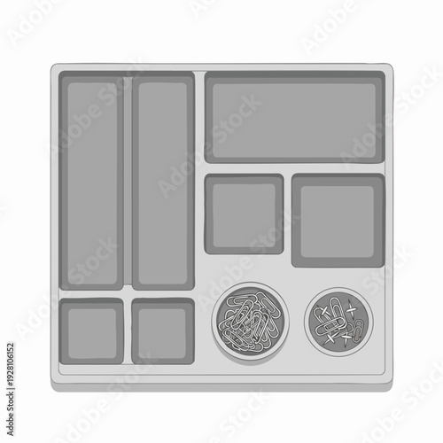 Gray desk organizer tray with compartments containing paper clips and push pins for tidy office workspace; top-down view