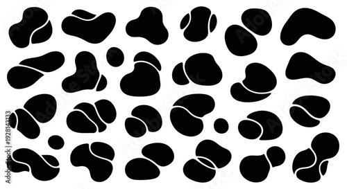 Black leopard spots on a white background, animal print pattern.